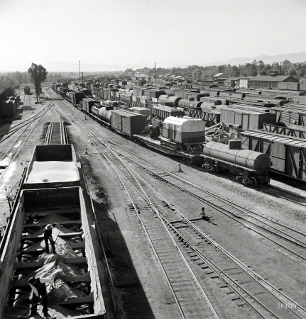 Photo showing: Needles -- March 1943. Needles, California. A general view of the Atchison, Topeka & Santa Fe rail yard.