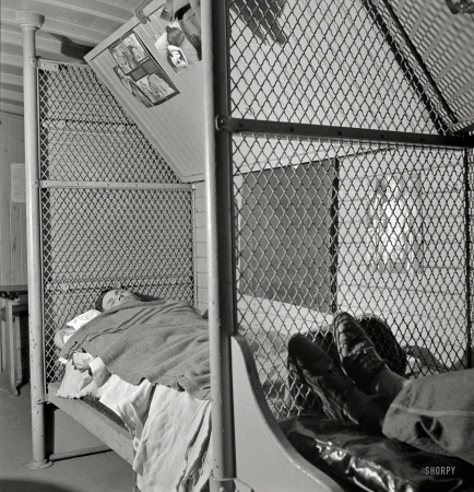 Photo showing: Next Stop, Sleepytown -- March 1943. Barstow, California. AT&SF Conductor David L. Webb sleeping in his caboose.