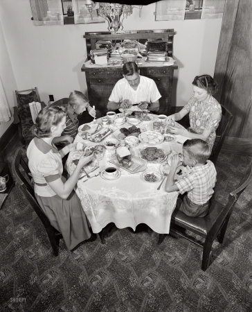 Photo showing: Family Style -- September 1942. Rochester, New York. The Babcocks at the dinner table.