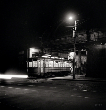 Photo showing: Night Ride -- April 1943. Baltimore, Maryland. Trolley leaving the terminal at night.