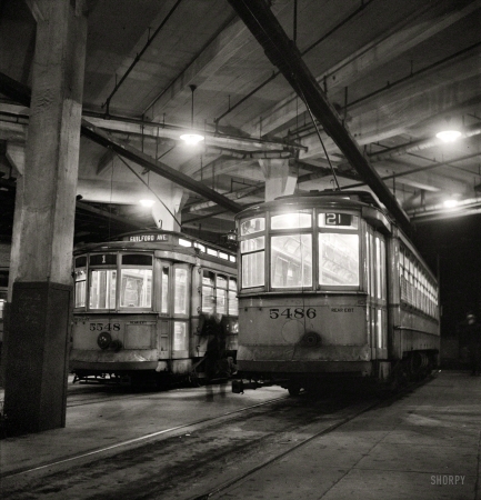 Photo showing: Park Terminal -- April 1943. Baltimore, Maryland. Trolleys inside the Park Terminal at night.