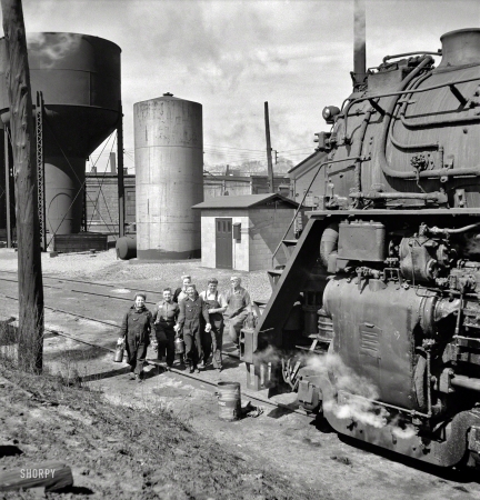 Photo showing: Engine Wipers -- May 1943. Clinton, Iowa. Women wipers of the Chicago & North Western Railroad.