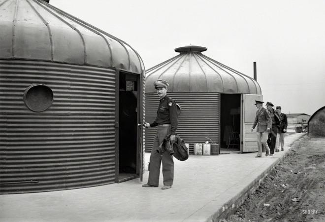 Photo showing: Round House -- Circa 1943, two Dymaxion Deployment Units in
North Africa, with Carl Spaatz leading the group at right.