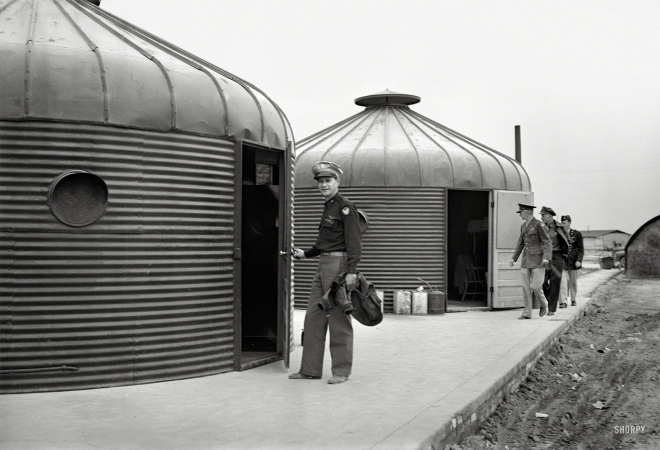Photo showing: Round House -- Circa 1943, two Dymaxion Deployment Units in
North Africa, with Carl Spaatz leading the group at right.