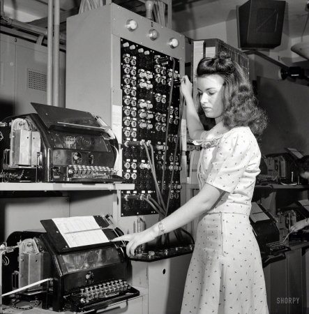 Photo showing: Mid-Century Internet -- June 1943. Washington, D.C. Muriel Pare, a switching clerk at the Western Union telegraph office.