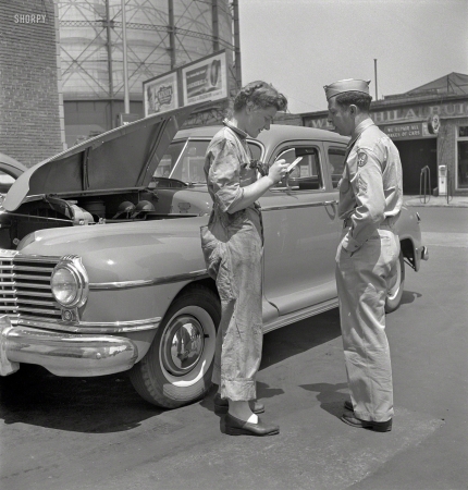 Photo showing: Serviceman,  Service Woman -- June 1943. Philadelphia. Miss Frances Heisler, a garage attendant at one of the Atlantic Refining Company garages.