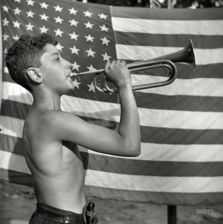 Photo showing: Bugle Boy -- August 1943. Southfields, New York. Mess call at Camp Nathan Hale, where children are aided by the Methodist Camp Service.