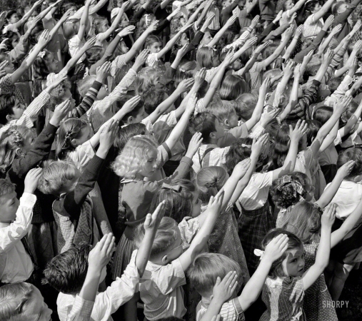 Photo showing: To the Republic -- May 1942. Southington, Connecticut. Schoolchildren pledging allegiance to the flag.