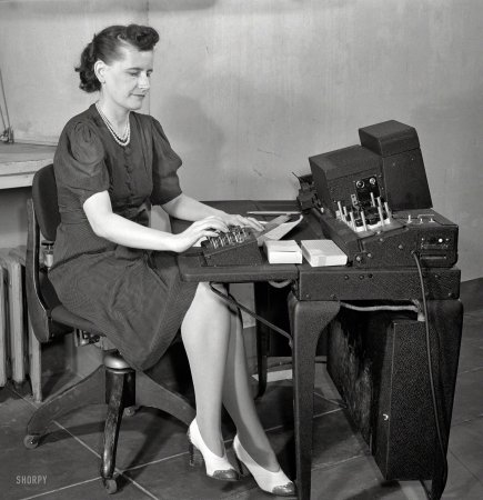 Photo showing: Data Entry -- June 1942. U.S. Office of Defense Transportation system of port control and its traffic channel control.