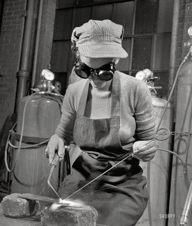 Photo showing: Goggles Girl -- July 1942. Welding trainee, Work Projects Administration vocational school in Washington, D.C. 