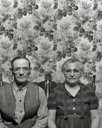 Photo showing: The Wallflowers -- June 1943. Gloucester, Mass. Mr. and Mrs. Joseph Lopez. They have two boys in
the armed forces, six children altogether. He is a fish skinner in the Gorton-Pew fishery. 