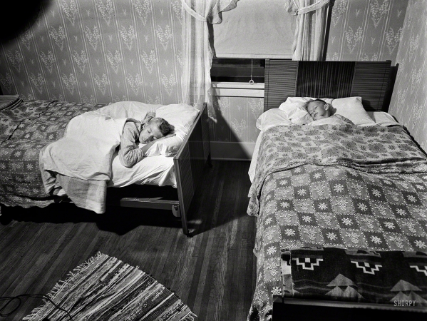 Photo showing: Bedtime for Babcock -- September 1942. Rochester, New York. The two Babcock boys share one room.