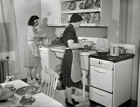 Photo showing: Helping Mom -- New Bedford, Massachusetts Spring 1942. Family living in in low-income government housing project.