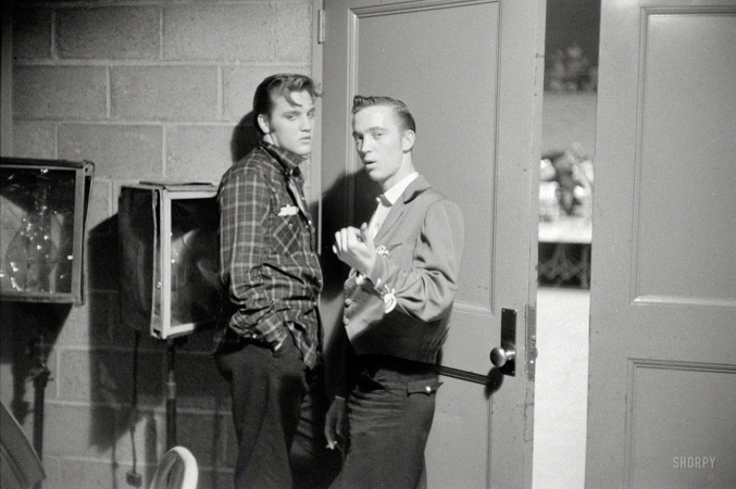Photo showing: Stage Door -- May 27, 1956. Dayton, Ohio. Elvis Presley with his cousin Gene Smith backstage at the University of Dayton field house.