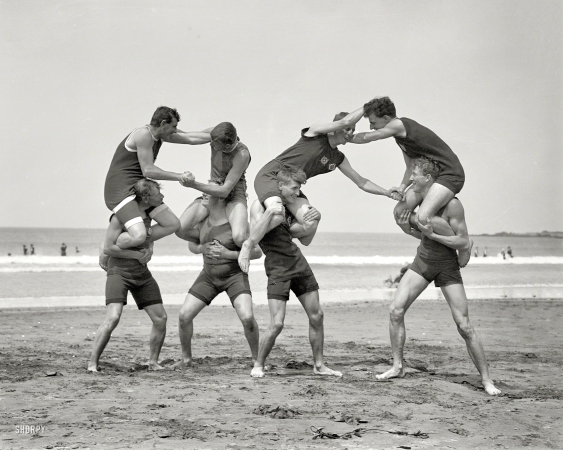 Photo showing: Cock Fight -- 1914. Maranui Surf Life Saving Club 'cock fighting' at Lyall Bay, Wellington, N.Z..