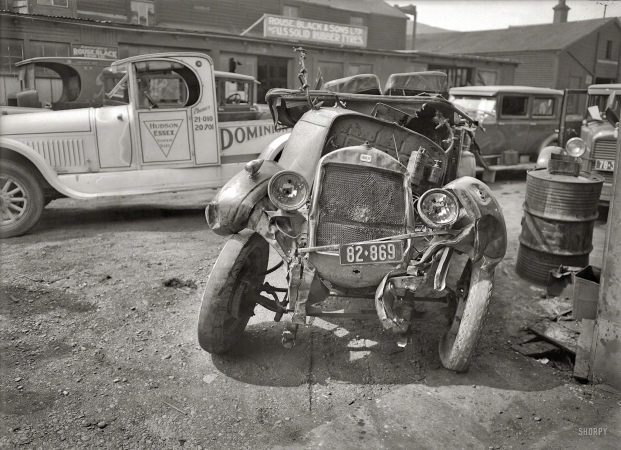 Photo showing: Bent Out of Shape -- Wellington, New Zealand, circa 1928. Car wreck after an accident.