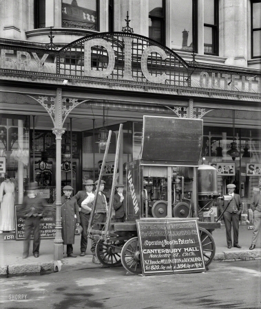 Photo showing: Do Not Touch -- Christchurch, New Zealand, circa 1910. Vacuum Cleaning Co. machine at DIC store.