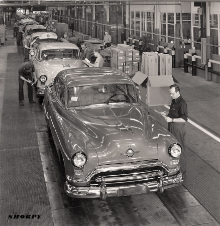 Photo showing: New Oldsmobiles -- 1951 Oldsmobile final assembly.